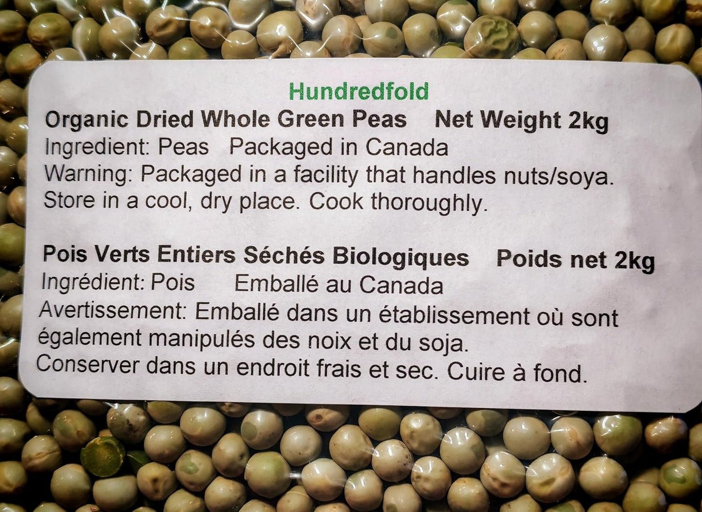 Bilingual product label (English/French) for organic dried green peas – 2KG bag, certified organic, non-GMO, and grown in  Canada.
